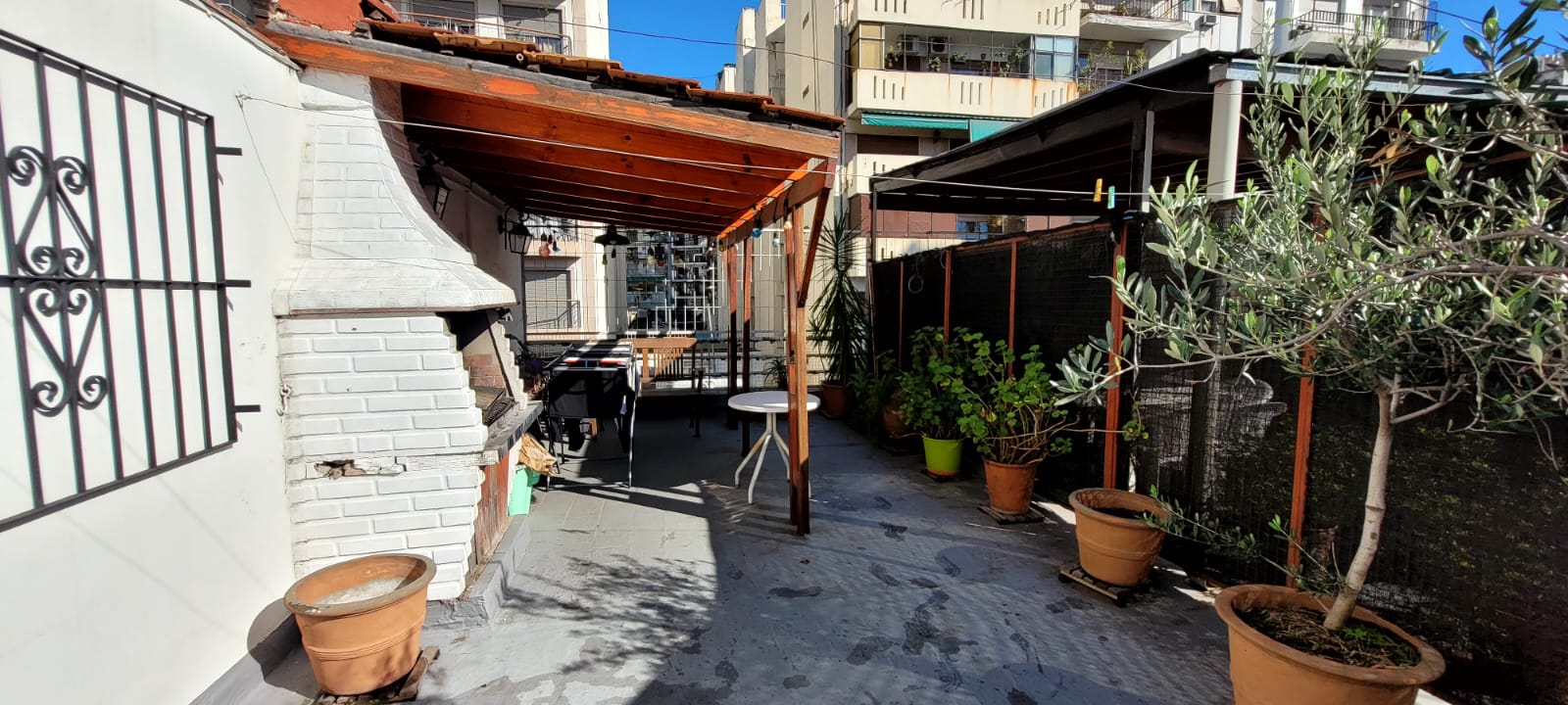 Terraza con parrilla
